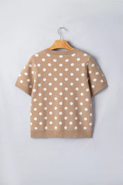Camel polka dot short sleeve knit cardigan with white dots and ribbed trim.