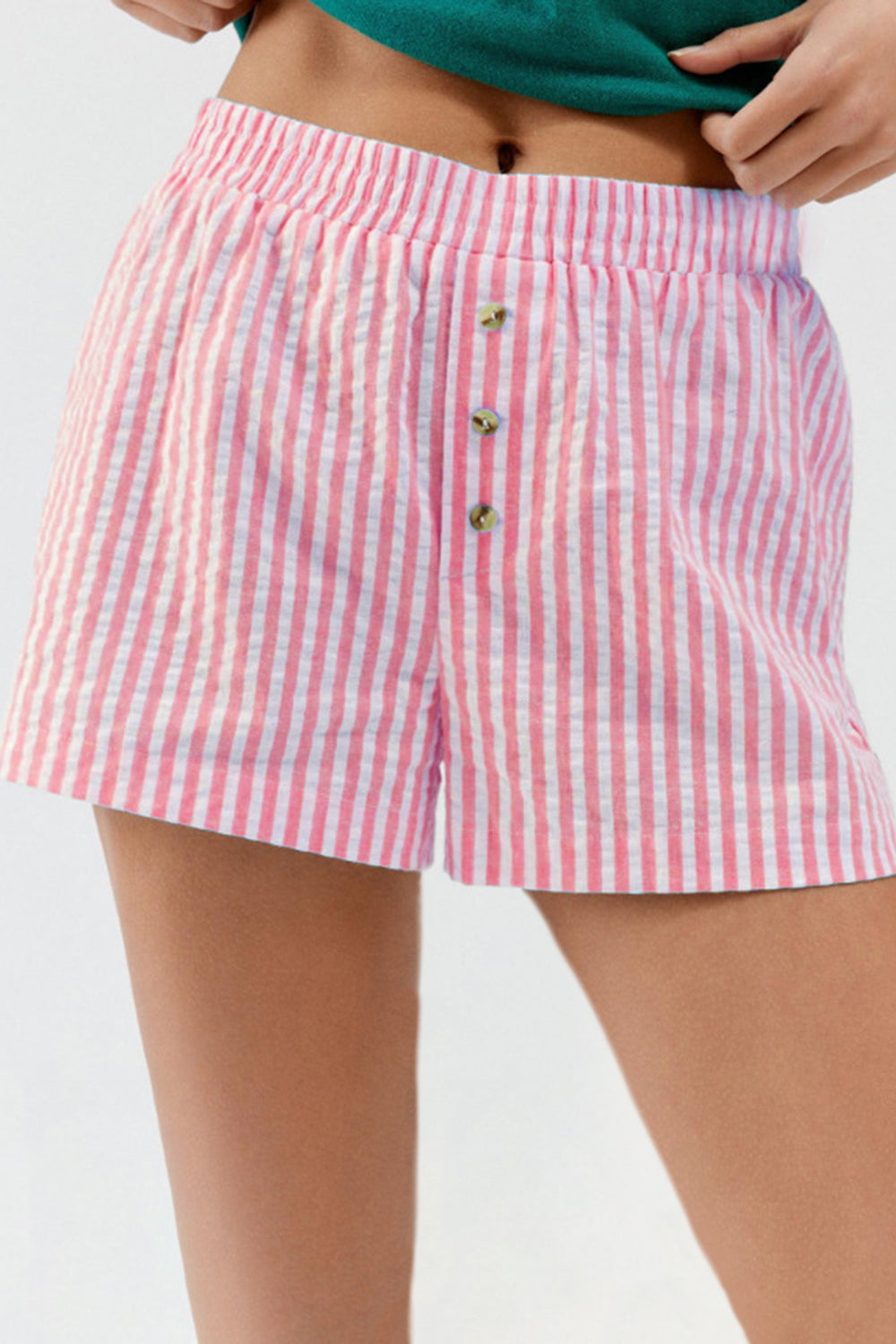 Seersucker boxer shorts in pink and white stripe with button fly and elastic waist.