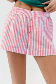 Seersucker boxer shorts in pink and white stripe with button fly and elastic waist.