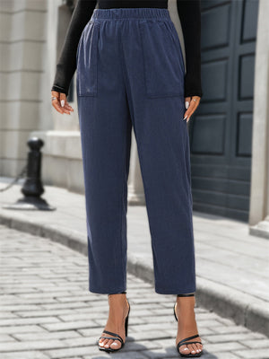 Navy corduroy relaxed fit trousers with elastic waist and front pockets