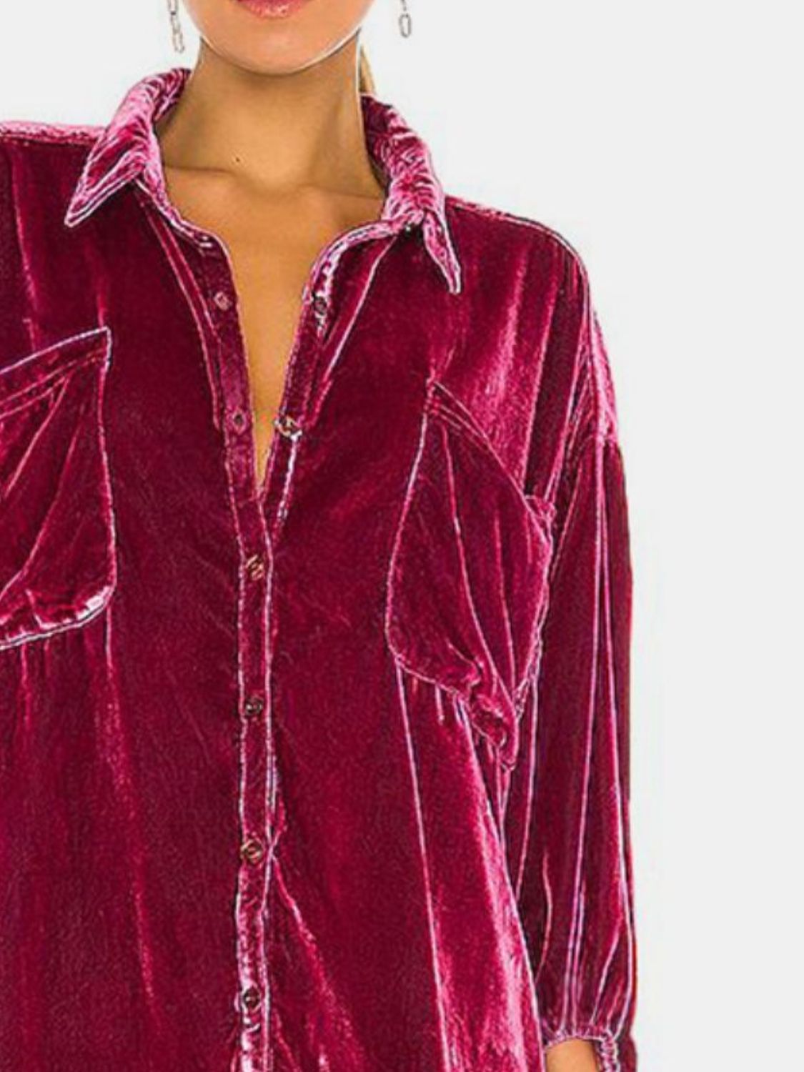 Velvet oversized shirt in deep purple with button front and chest pockets.