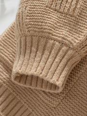 Camel chunky knit cardigan with ribbed cuffs and cable knit detail.