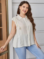 Light yellow collared blouse with ruffled cap sleeves and button front.