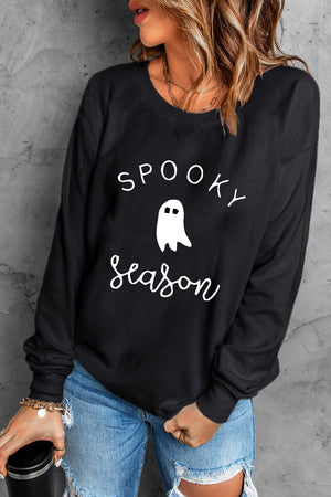 Black crewneck sweatshirt with white ghost and Spooky Season graphic.