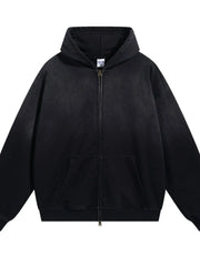 Black vintage wash oversized zip-up hoodie with front pocket and drawstring hood.