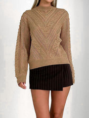 Camel textured chevron knit pullover sweater with bobble details and cutout pattern.