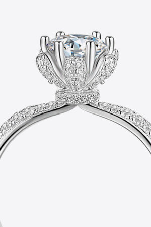 Silver halo ring with a large center stone and pave band