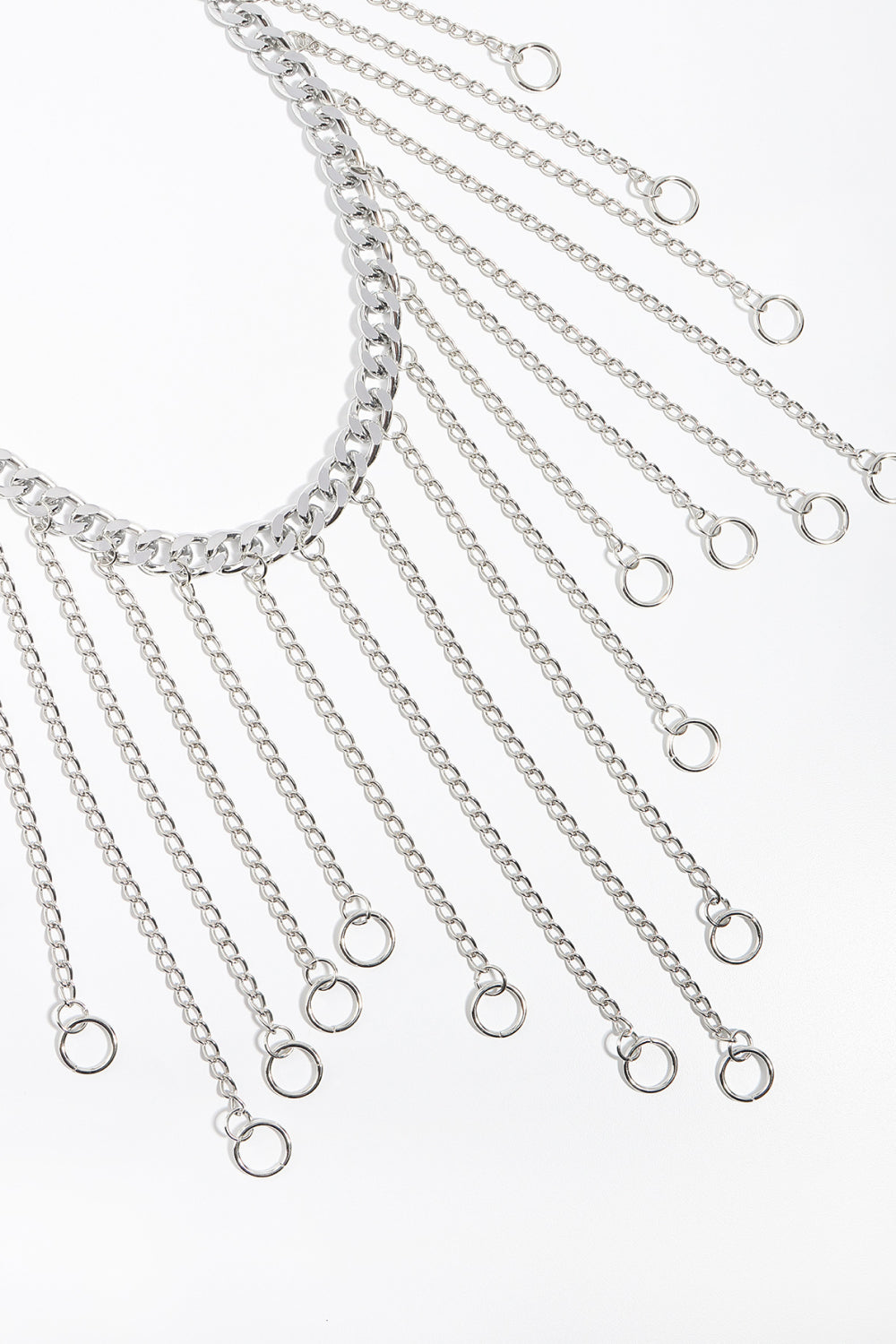 Silver chainmail belt with cascading chains and rings.