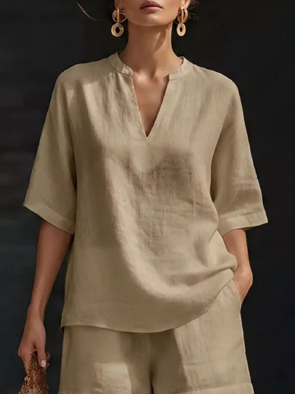 Khaki notched V-neck two-piece set with pockets, casual linen blend top and shorts.