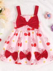Pink cherry print baby dress with red bows and spaghetti straps.