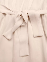 Beige midi dress with a tie-waist and ruffled sleeves.