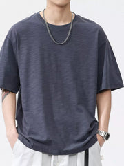 Men's relaxed fit dark gray cotton t-shirt with crew neck and short sleeves.