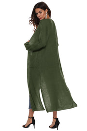 Longline knit cardigan in Army Green with side slits and pockets.