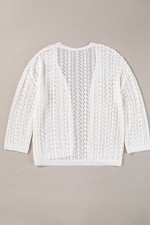 White open-knit crochet cardigan with long sleeves and a V-neck.