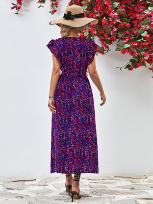 Emerald floral wrap midi dress with flutter sleeves and belted waist in Blue Purple.