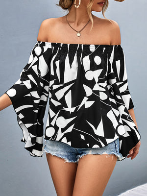 Black and white geometric print off-shoulder blouse with flared sleeves