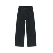 Dark wash oversized baggy denim trousers with wide legs and a relaxed fit.