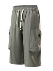Light gray cargo capris with adjustable drawstring and large side pockets.