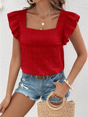 Red textured square neck blouse with ruffle sleeves.
