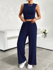 Dark blue ribbed crop top and wide-leg lounge pants with drawstring waist