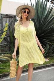 Light yellow open-knit beach cover-up with V-neck and side slit, short sleeves.