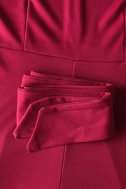Deep Red belted palazzo jumpsuit with folded fabric belt detail