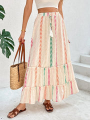 Chevron stripe tiered maxi skirt with drawstring and tassel detail in multicolor.