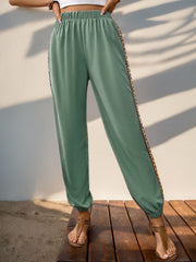 Gum Leaf relaxed-fit joggers with embroidered trim detail on side seam