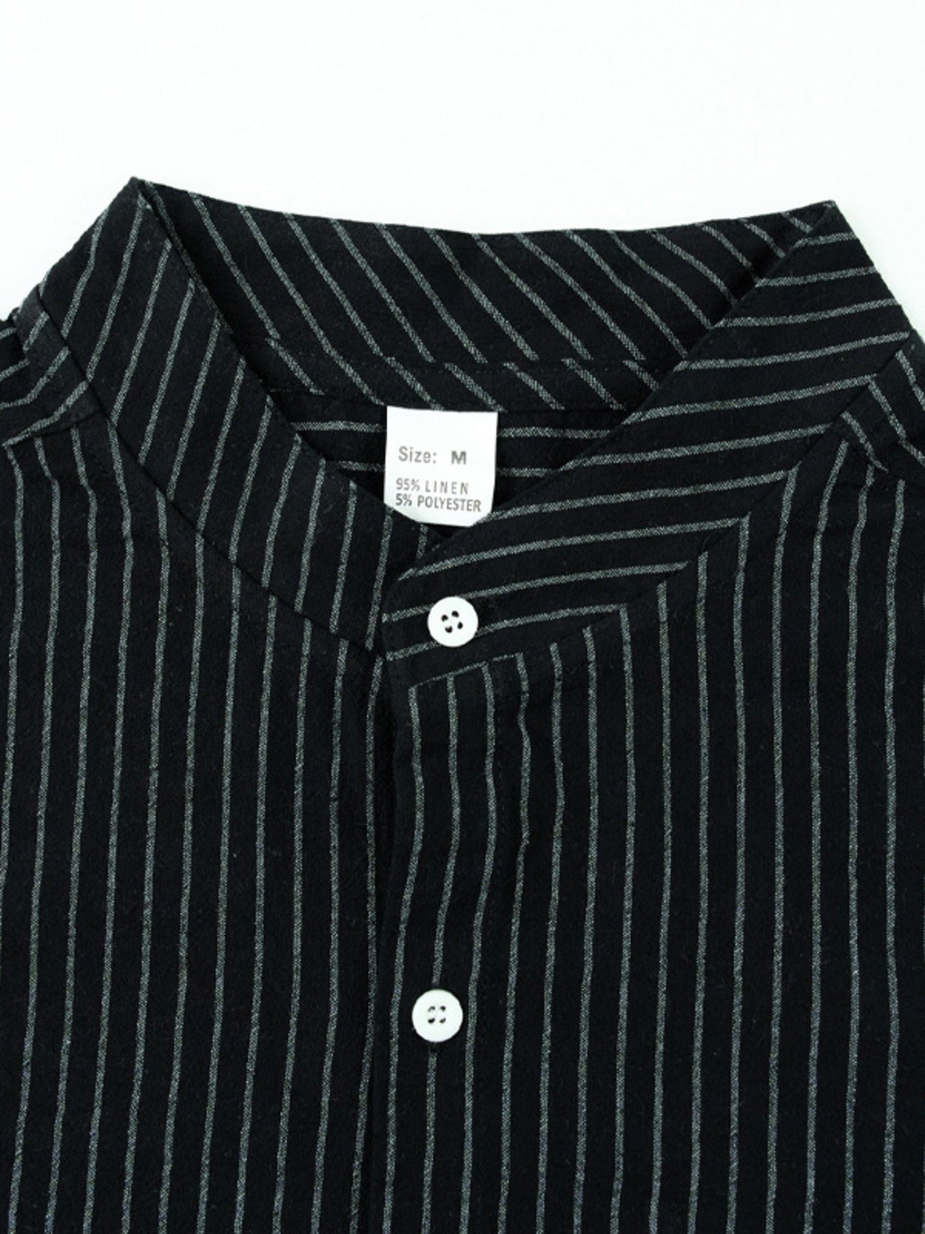 Black striped long sleeve men's shirt with band collar and button detail.