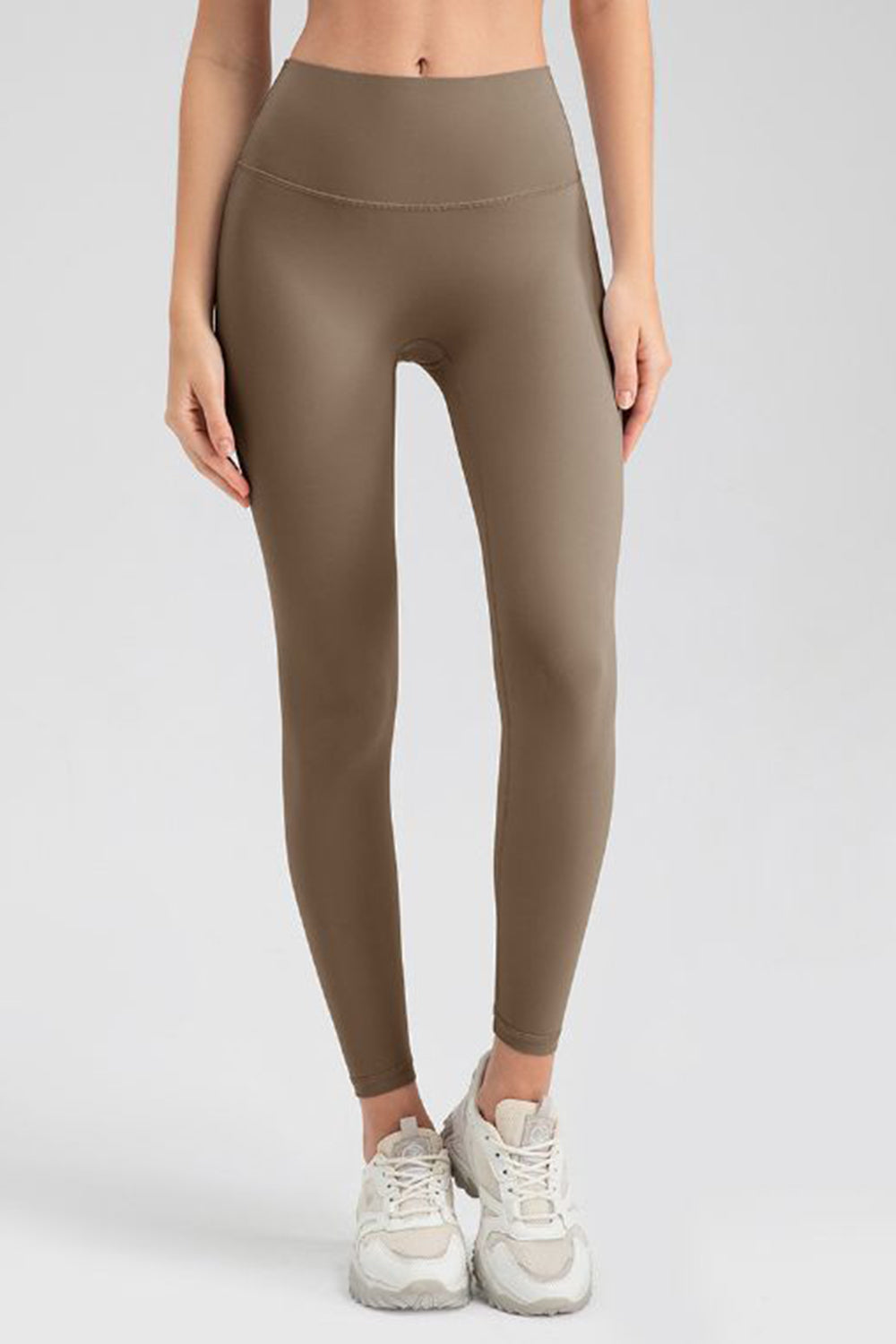 Women's Khaki sculpted contour leggings with a high waist.