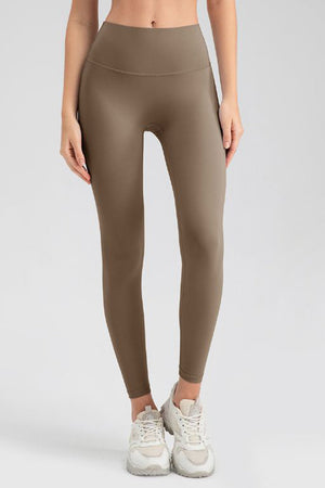Women's Khaki sculpted contour leggings with a high waist.