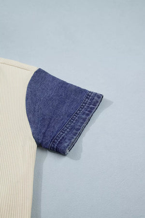 Ribbed knit shirt with blue denim short sleeves and cuff detail.