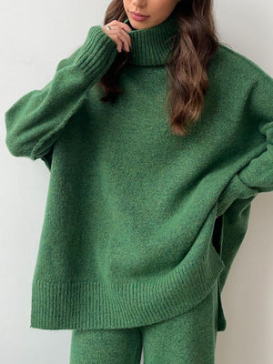 Oversized green turtleneck lounge knit sweater with ribbed cuffs and hem.