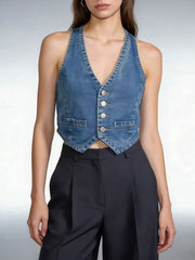 Light blue cropped denim vest with button-down front and pocket details.