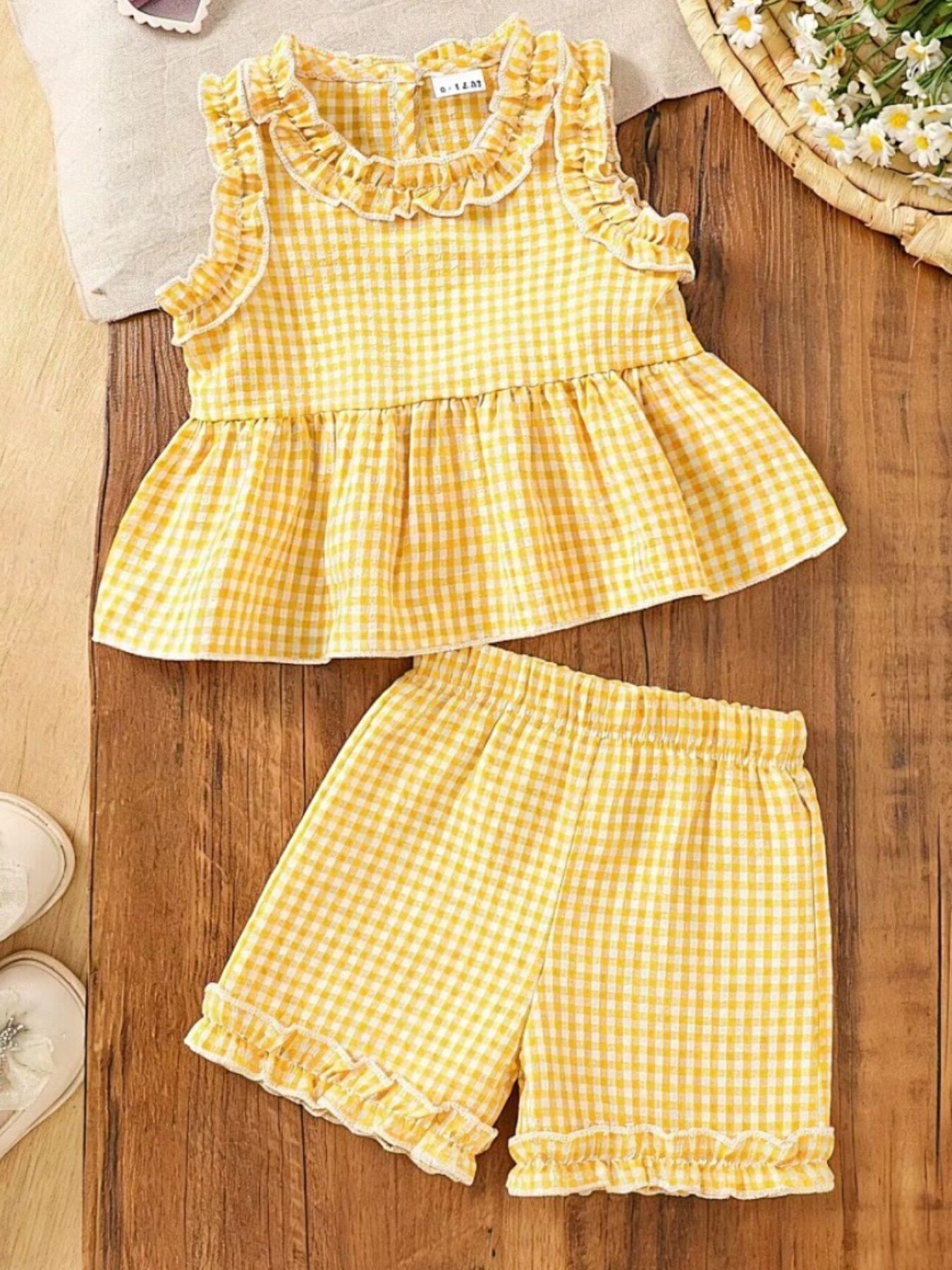 Children's yellow gingham ruffle two-piece set with ruffled shorts and neckline