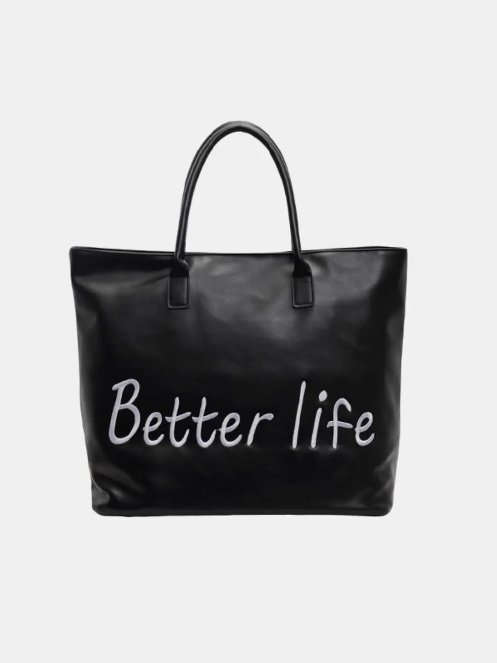 Black tote bag with white "Better Life" graphic and top handles.