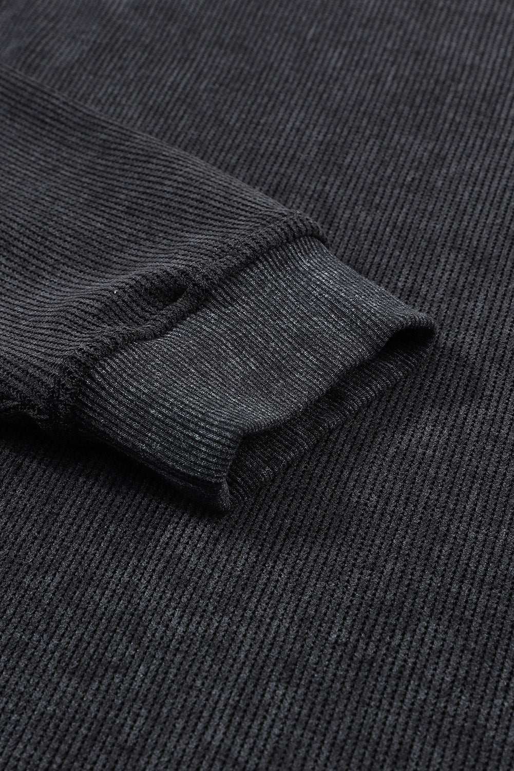 Black ribbed knit sweatshirt cuff detail