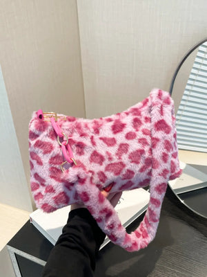 Fuchsia pink leopard print faux fur shoulder bag with chain detail