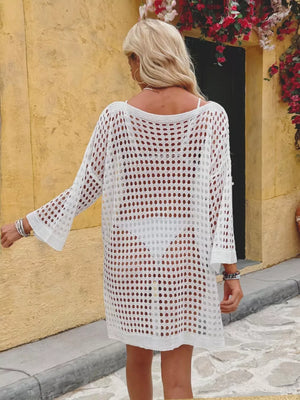 White openwork crochet knit swim cover-up with crew neck and bell sleeves.