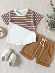 Baby two-piece set with brown and white striped top and brown shorts.