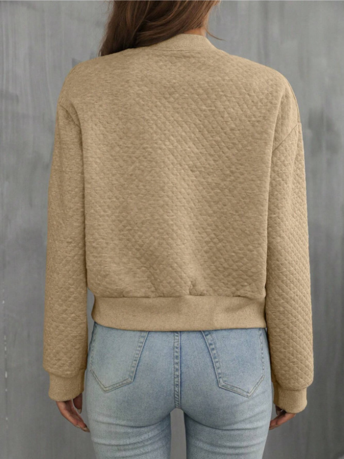 Diamond quilted bomber jacket in camel with ribbed cuffs and hem.