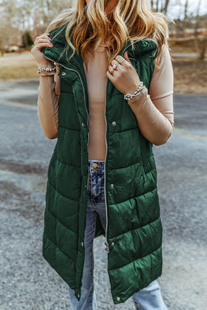 Longline hooded puffer vest in green with a full zip front and quilted detail.