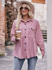Pink corduroy peplum shirt jacket with buttoned pockets and a flared hem.
