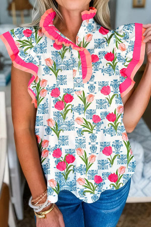 Tulip print cotton blouse with ruffled collar and flutter sleeves.