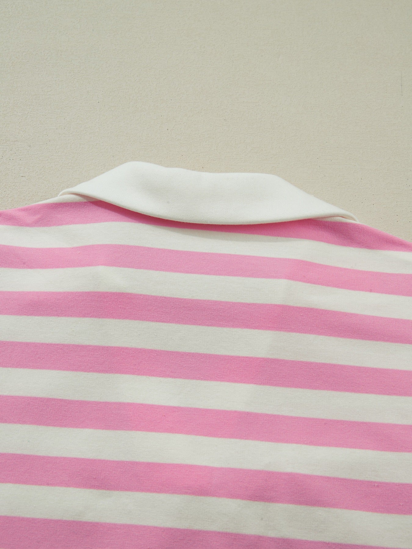 Cotton striped blouse in blush pink and white with a white collar.