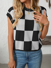 Checkerboard knit cap sleeve top in black and white, crewneck, casual style.