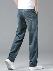 Men's relaxed fit denim sweatpants in light blue, with a comfortable casual style.