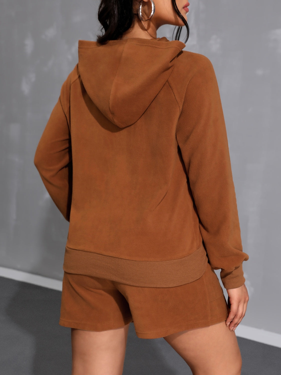 Caramel fleece loungewear set with raglan sleeve hoodie and ribbed hem shorts.