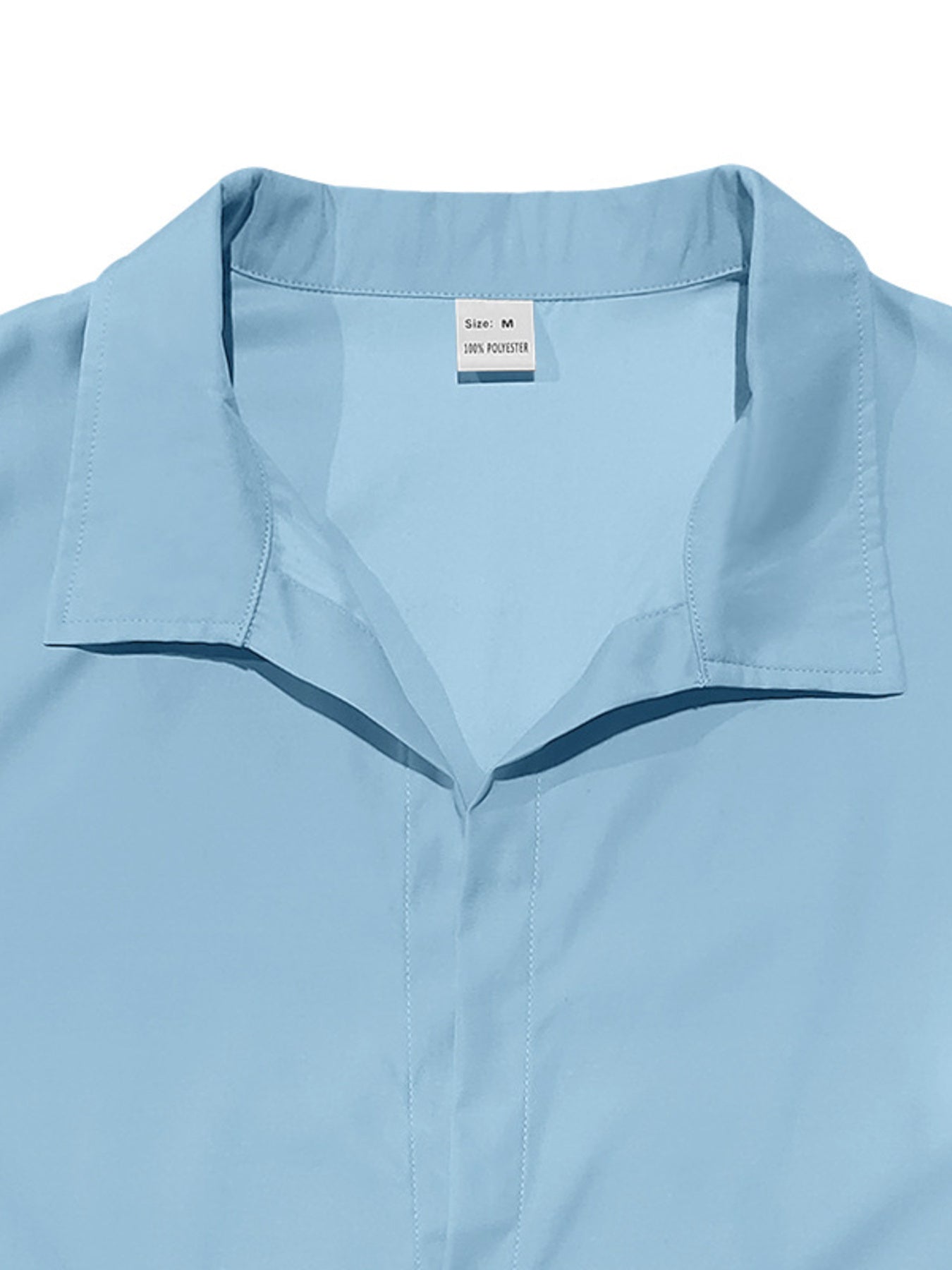 Light blue long-sleeve men's collared shirt with button-down front and polyester material.
