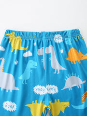 Kids' blue dinosaur print pajama shorts with elastic waistband and playful ROAR text.